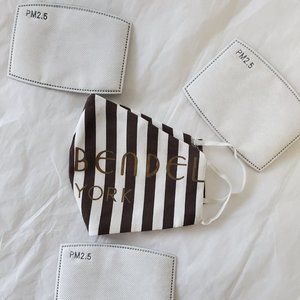 One Henri Bendel Mask with 3 filters included